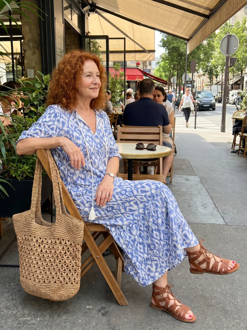 Blue printed tie-neck midi dress with short sleeves and flowing skirt