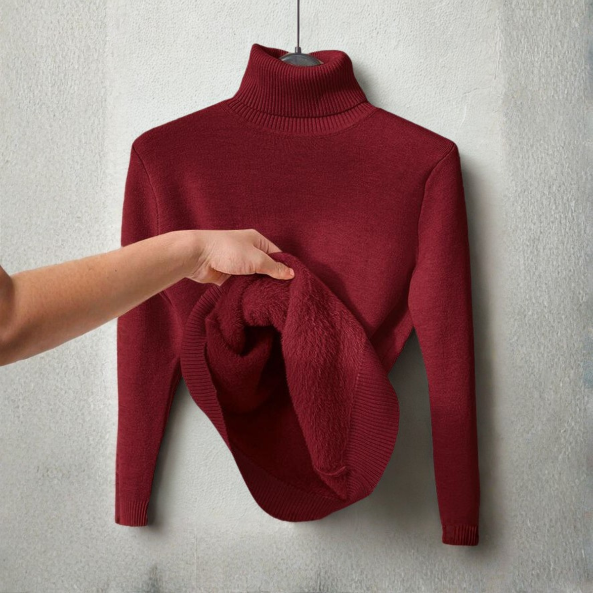 Burgundy turtleneck long-sleeve sweater with ribbed collar; folded scarf draped on front