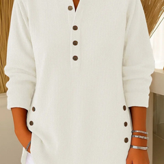 White button henley tunic with long sleeves and button-front placket
