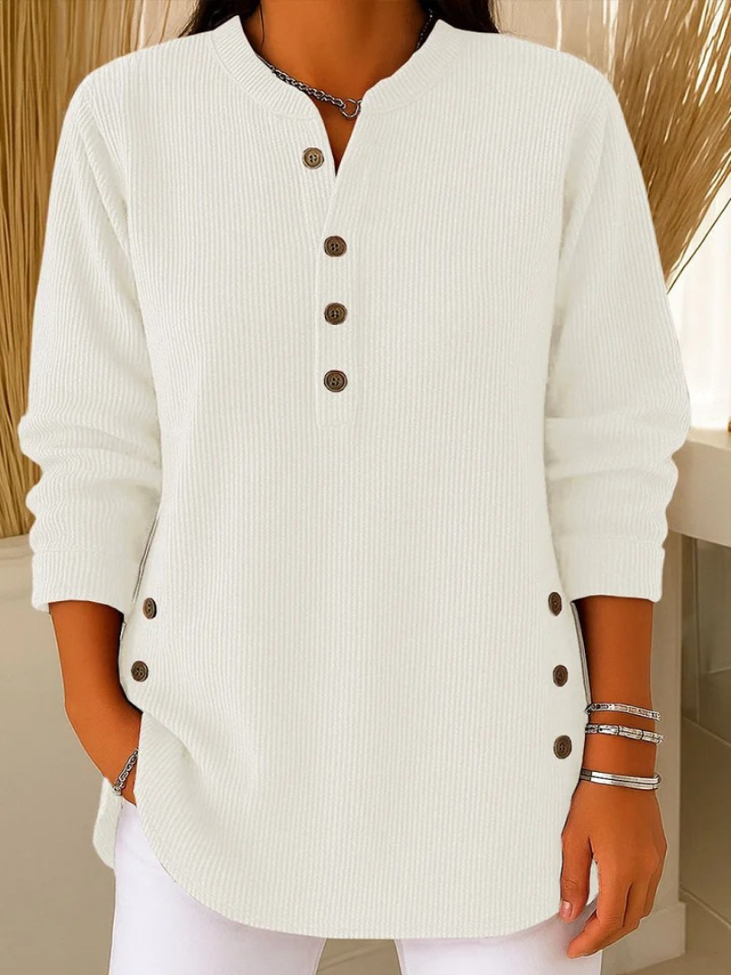 White button henley tunic with long sleeves and button-front placket