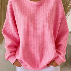 NYLA classic sweater in pink waffle-knit, crewneck, long sleeves with ribbed cuffs.