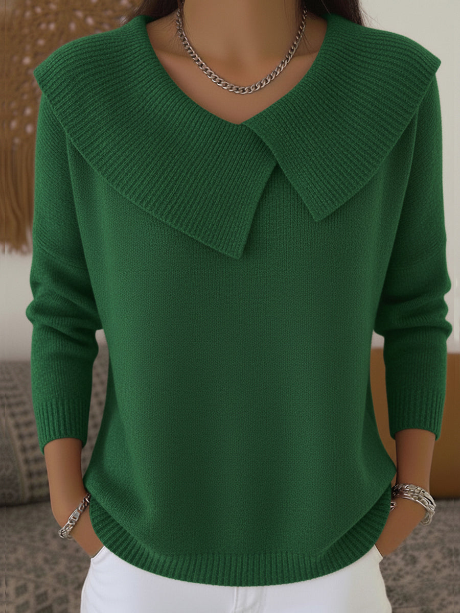 Warm sweater with soft collar, green knit with pointed folded shoulders