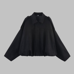 Loose military jacket in black with turn-down collar and center zip front