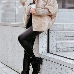 Cream plush hooded jacket with zip front, ribbed cuffs, and faux-fur lined hood