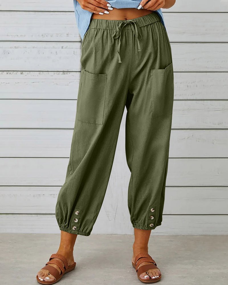 Army green relaxed-fit trousers with elastic waist, drawstring, side pockets, button cuff hem.