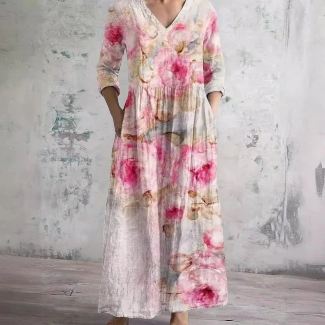 Pink floral V-neck long-sleeve summer dress with gathered waist and maxi length