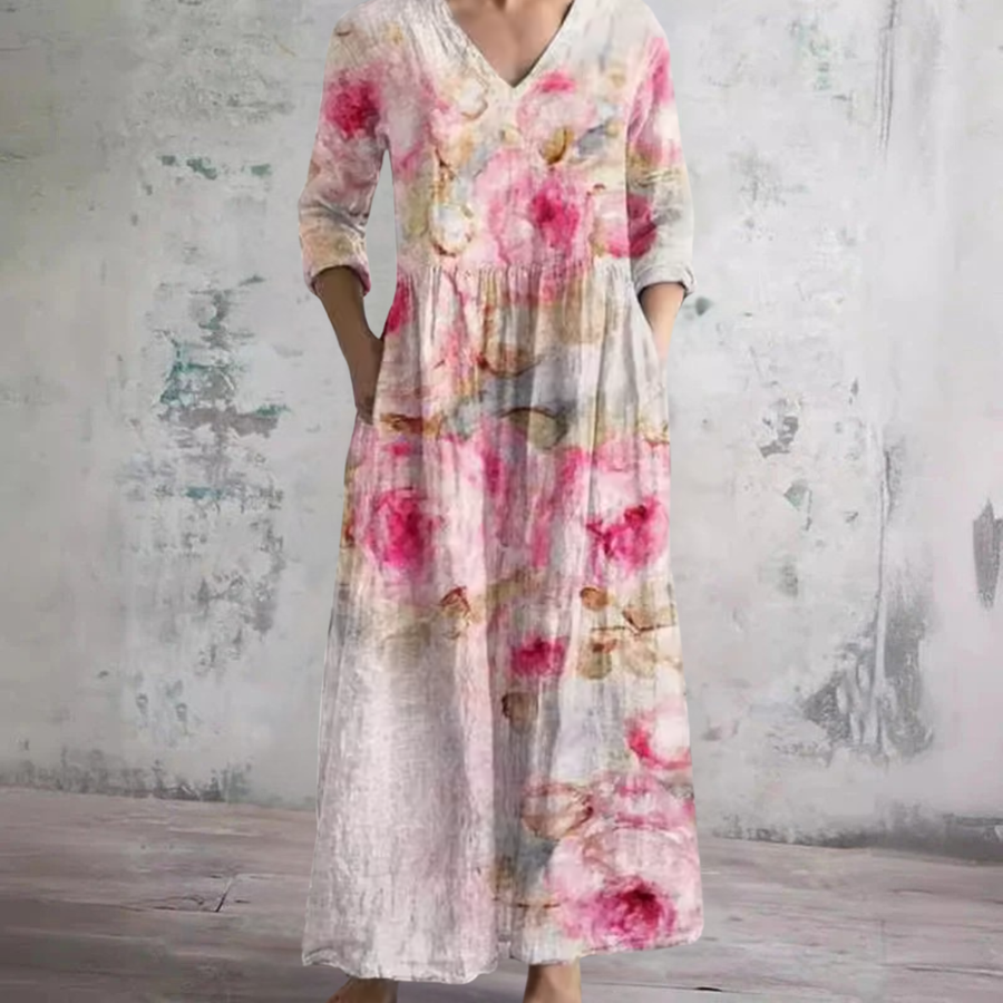 Pink floral V-neck long-sleeve summer dress with gathered waist and maxi length