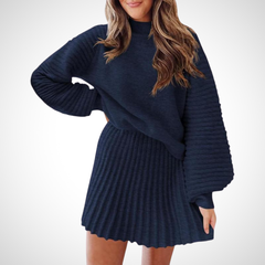 LOUISA navy blue ribbed knit two-piece with turtleneck sweater and pleated mini skirt