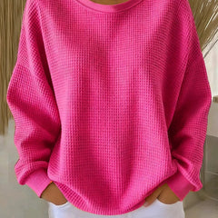 NYLA classic sweater in fuchsia waffle-knit, crewneck, long sleeves with ribbed cuffs.