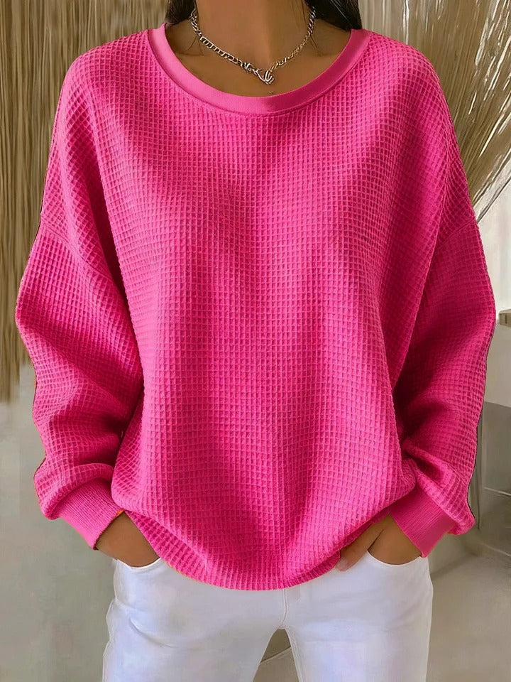 NYLA classic sweater in fuchsia waffle-knit, crewneck, long sleeves with ribbed cuffs.