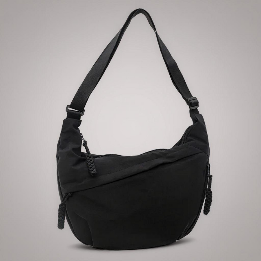 Black classic shoulder bag with adjustable strap and side zipper pocket