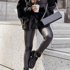 Black plush hooded jacket with zip front, faux-fur hood, ribbed cuffs