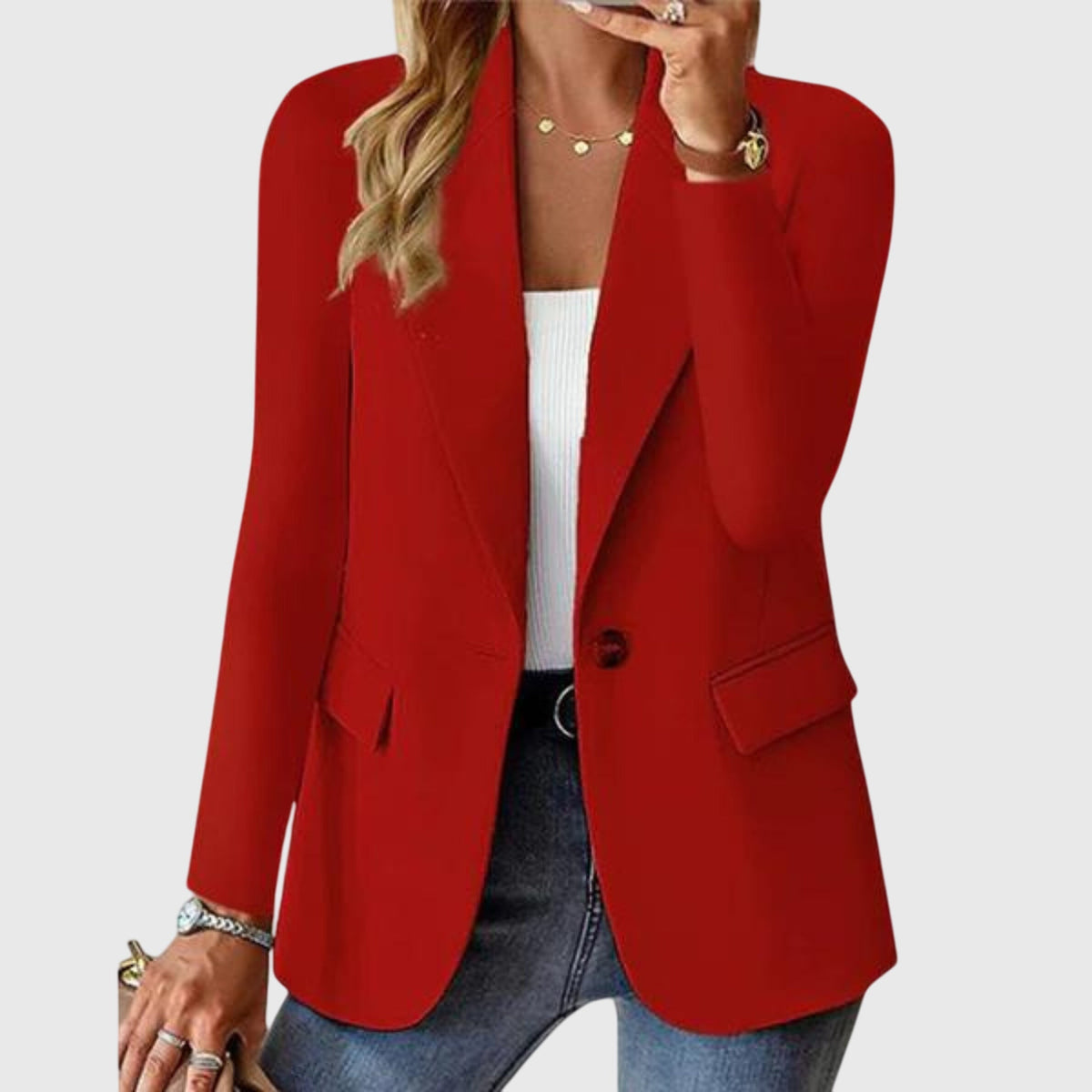 Red blazer with notch lapel, single-breasted button closure, flap pockets and side vents.