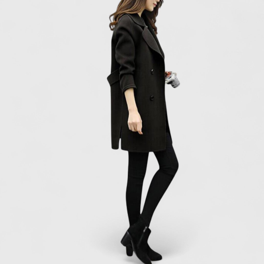 Women's black knee-length coat with notched lapel and button front