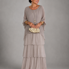 Lavender-gray tiered maxi dress with dolman sleeves and scoop neckline, softly layered skirt