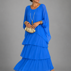 Bright blue tiered maxi dress with dolman sleeves and scoop neckline, airy layered ruffle tiers