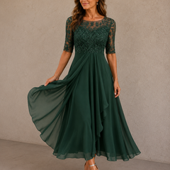 Abito elegante verde in pizzo e chiffon, maniche 3/4, gonna a pieghe