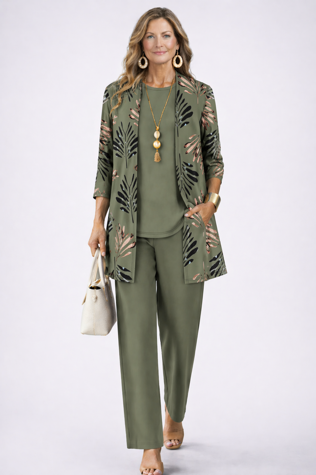 Olive green three-piece trouser set with leaf-pattern jacket and matching top