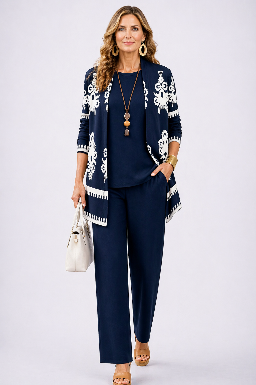 Navy three-piece trouser set with embroidered long cardigan and matching trousers