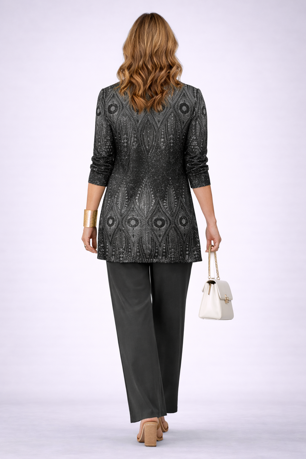 Back view of black three-piece trouser set: patterned blazer and straight trousers