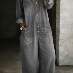 Grey washed denim overall with button-front, two chest pockets, long sleeves