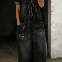 Black denim V-neck short-sleeve overall with tie front and two front pockets