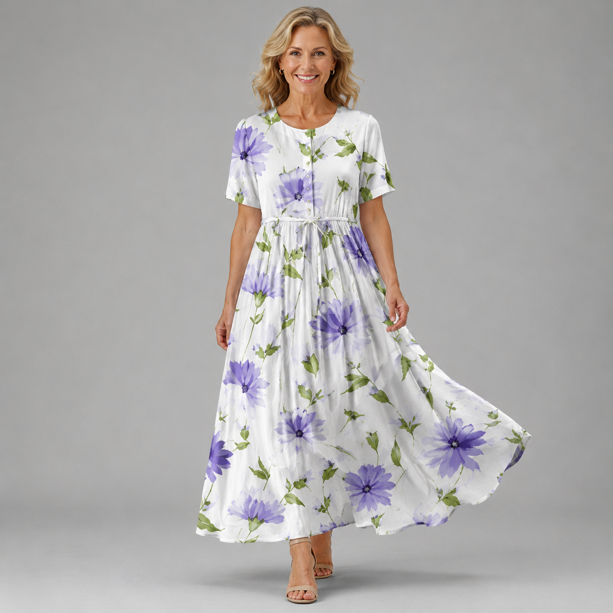 Aurora Bloom dress in white with purple flower and green leaf print, short sleeves, tiered skirt