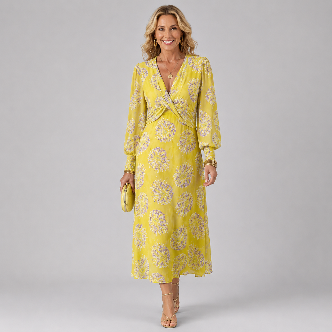 Yellow midi wrap dress with V-neck and purple daisy-like floral pattern, long sleeves