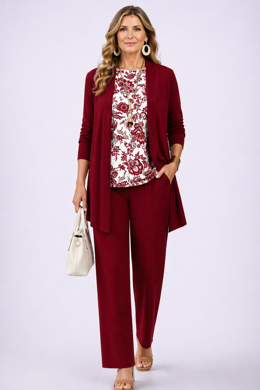 Burgundy three-piece trouser set with longline blazer, matching pants, patterned blouse