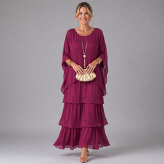 Burgundy tiered maxi dress with flowing layered skirt and loose, draped sleeves