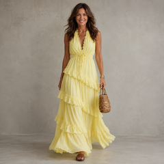 Yellow sleeveless maxi dress with layered ruffle hem and V-neck bodice