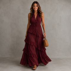 Burgundy sleeveless maxi dress with layered ruffle hem and V-neck bodice
