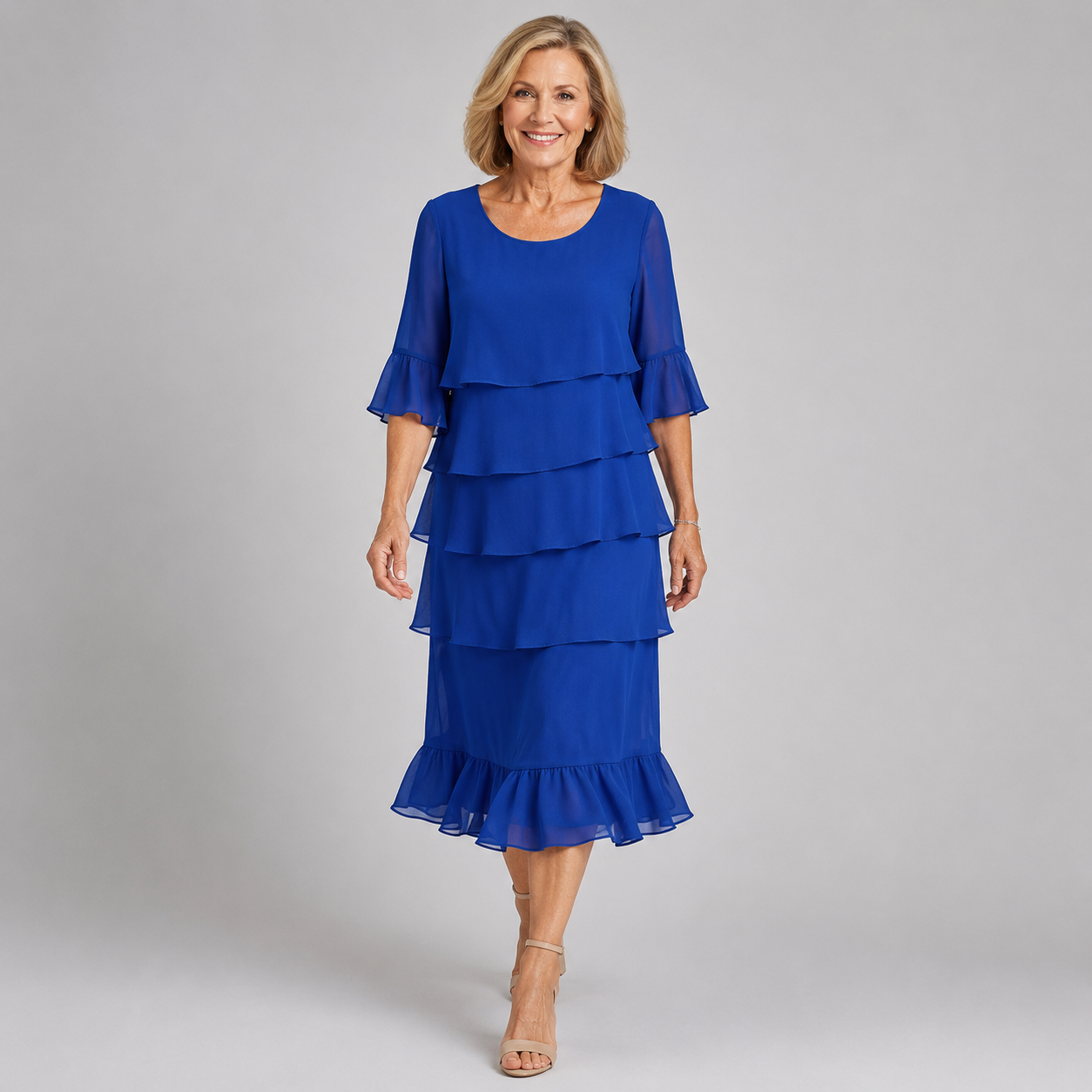 Blue ruffle tier dress with layered skirt and elbow-length sleeves