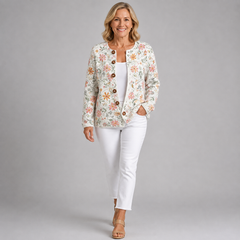 Women's floral knit cardigan with button-front, long sleeves, cream base and multicolor blooms