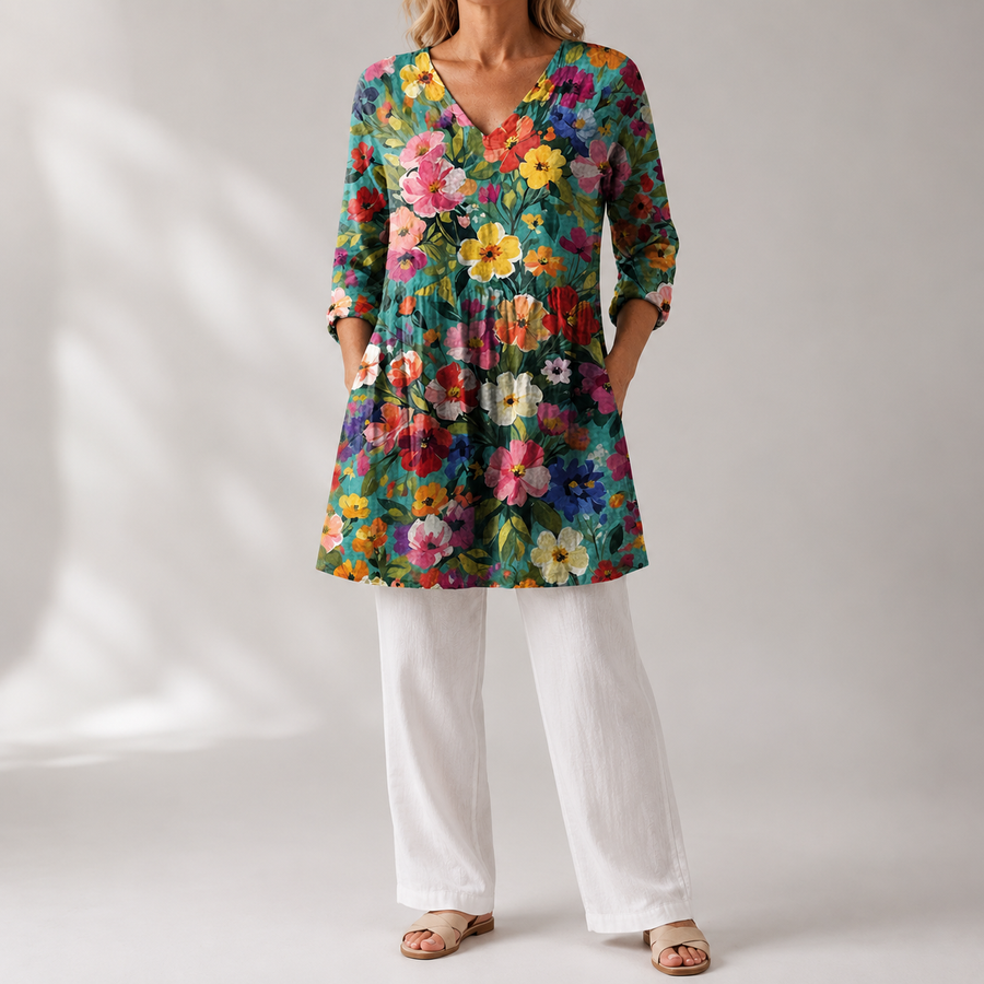 Floral V-neck blouse with gathered waist, multicolor blooms on teal