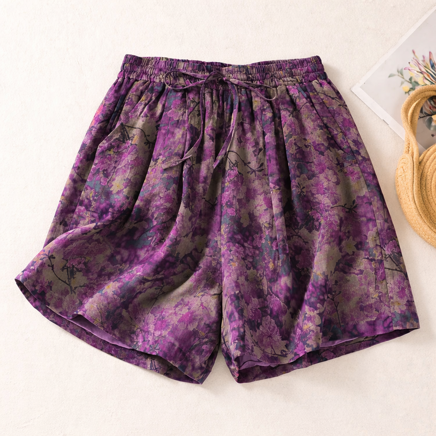 Indigo floral linen shorts with elastic waist and drawstring, relaxed straight hem