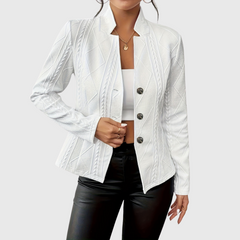 White textured blazer with notch lapels, long sleeves, and three-button front