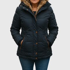 Cozy winter jacket in dark navy with faux fur hood, button-front and side pockets