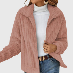 Dusty pink zip-up teddy fleece jacket with raised collar and full front zipper.