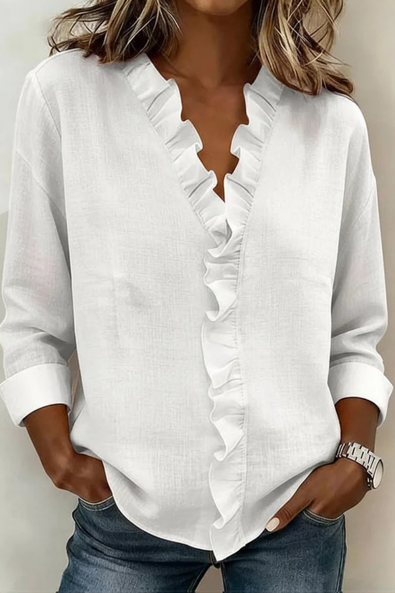 White ruffle V-neck long-sleeve blouse with scalloped front ruffle trim