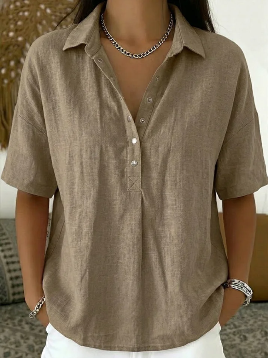 Women’s short-sleeve button-up shirt in khaki tan, collared with front button placket