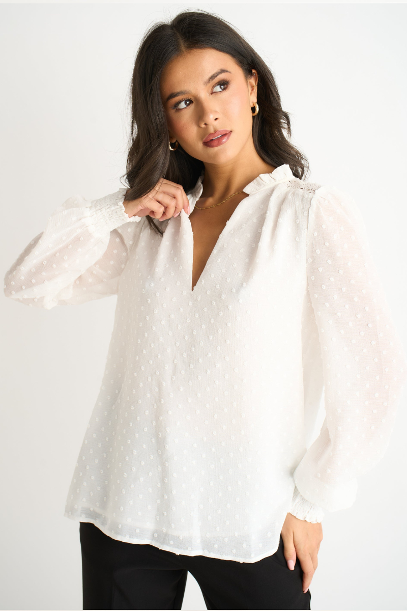 White polka-dot frill neck long-sleeve blouse with puff sleeves