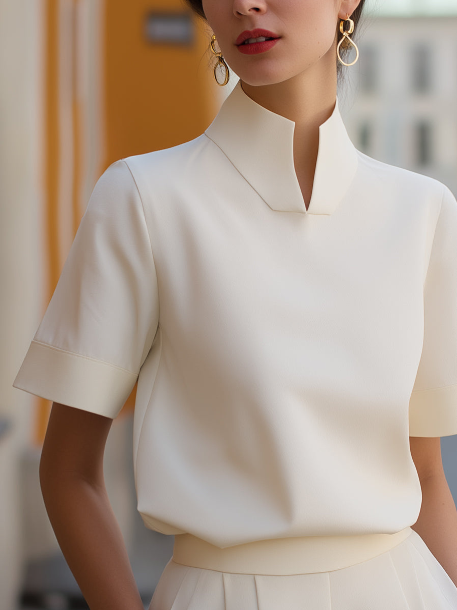 White short-sleeve stand-collar blouse with neat neckline seam
