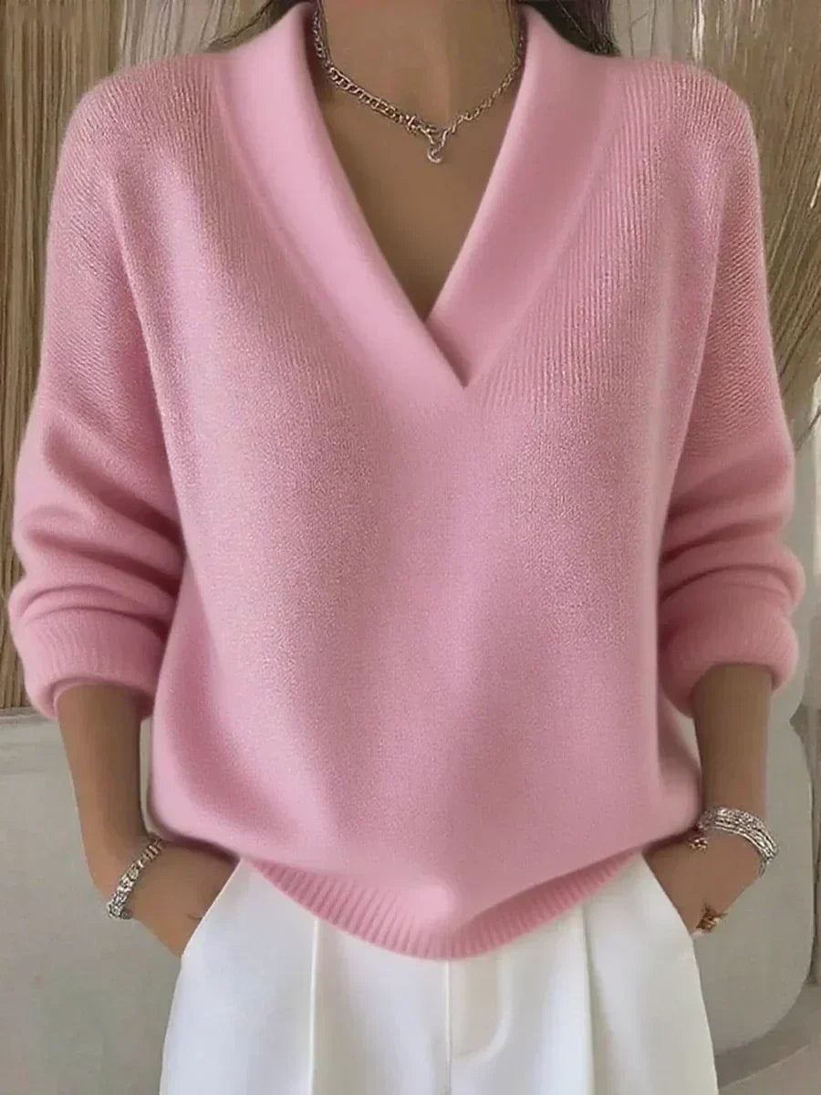 Pink relaxed V-neck knit sweater with ribbed cuffs and hem, long sleeves