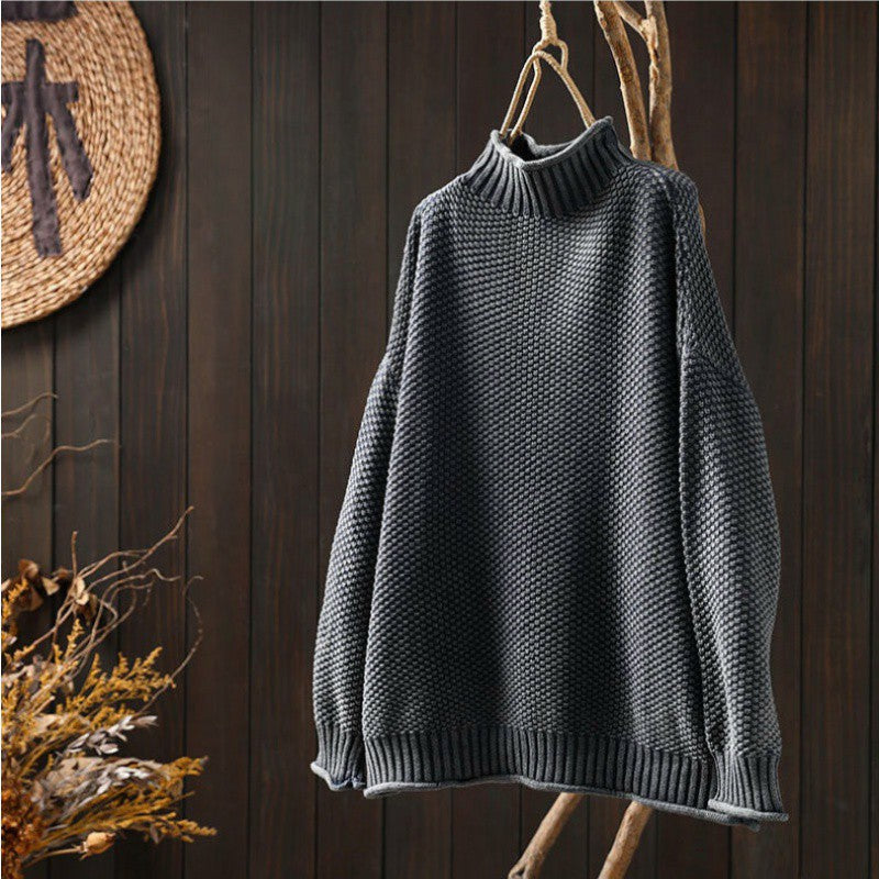 Grey waffle-knit sweater with mock neck, relaxed fit, ribbed cuffs and hem