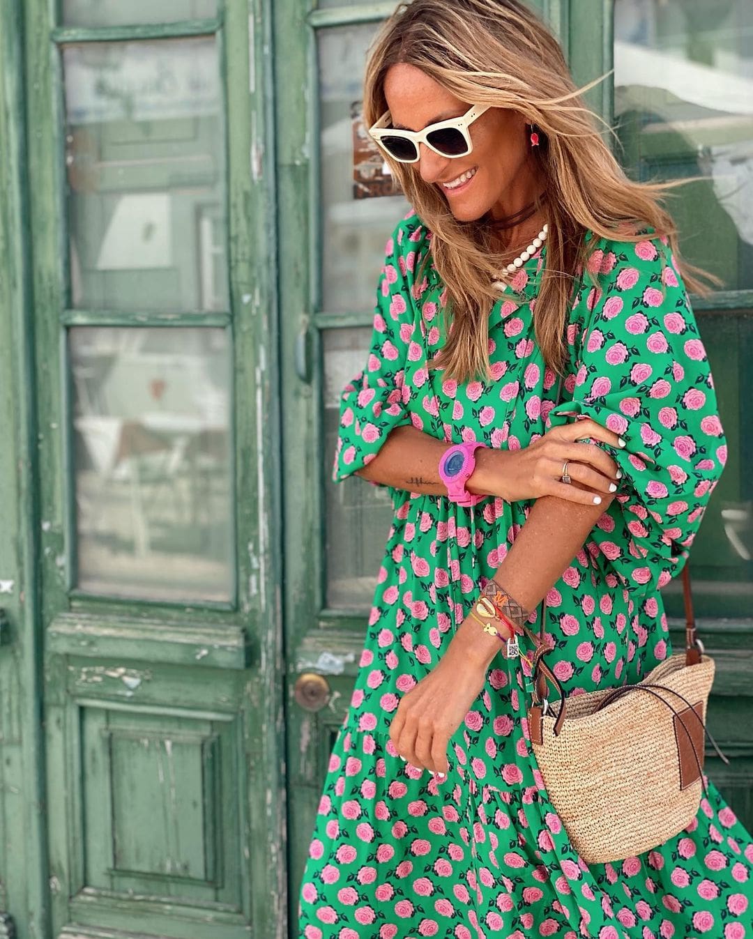 Boho maxi dress in green with pink dot pattern, V-neck and long sleeves with gathers