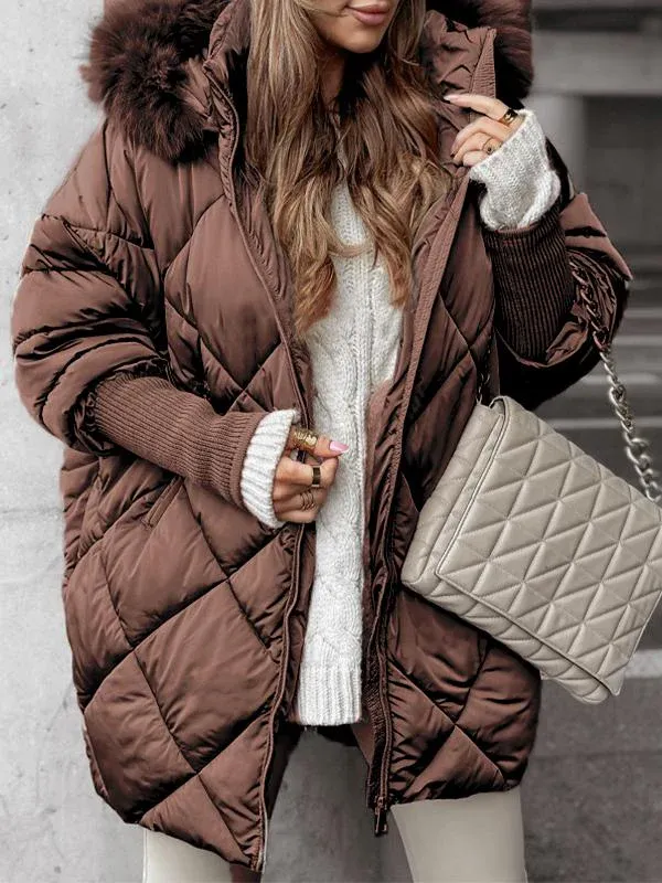 Brown quilted winter jacket with faux fur trimmed hood, zip front, ribbed cuffs