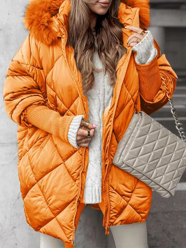 Orange quilted winter jacket with faux fur trimmed hood, zip front, ribbed knit cuffs