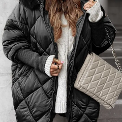 Black quilted winter jacket with faux fur hood, zip front, ribbed knit cuffs
