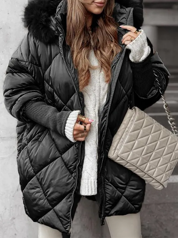 Black quilted winter jacket with faux fur hood, zip front, ribbed knit cuffs
